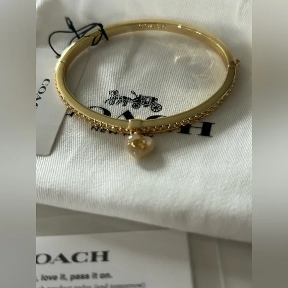 Coach viral pearl charm rhinestone gold hinge bracelet